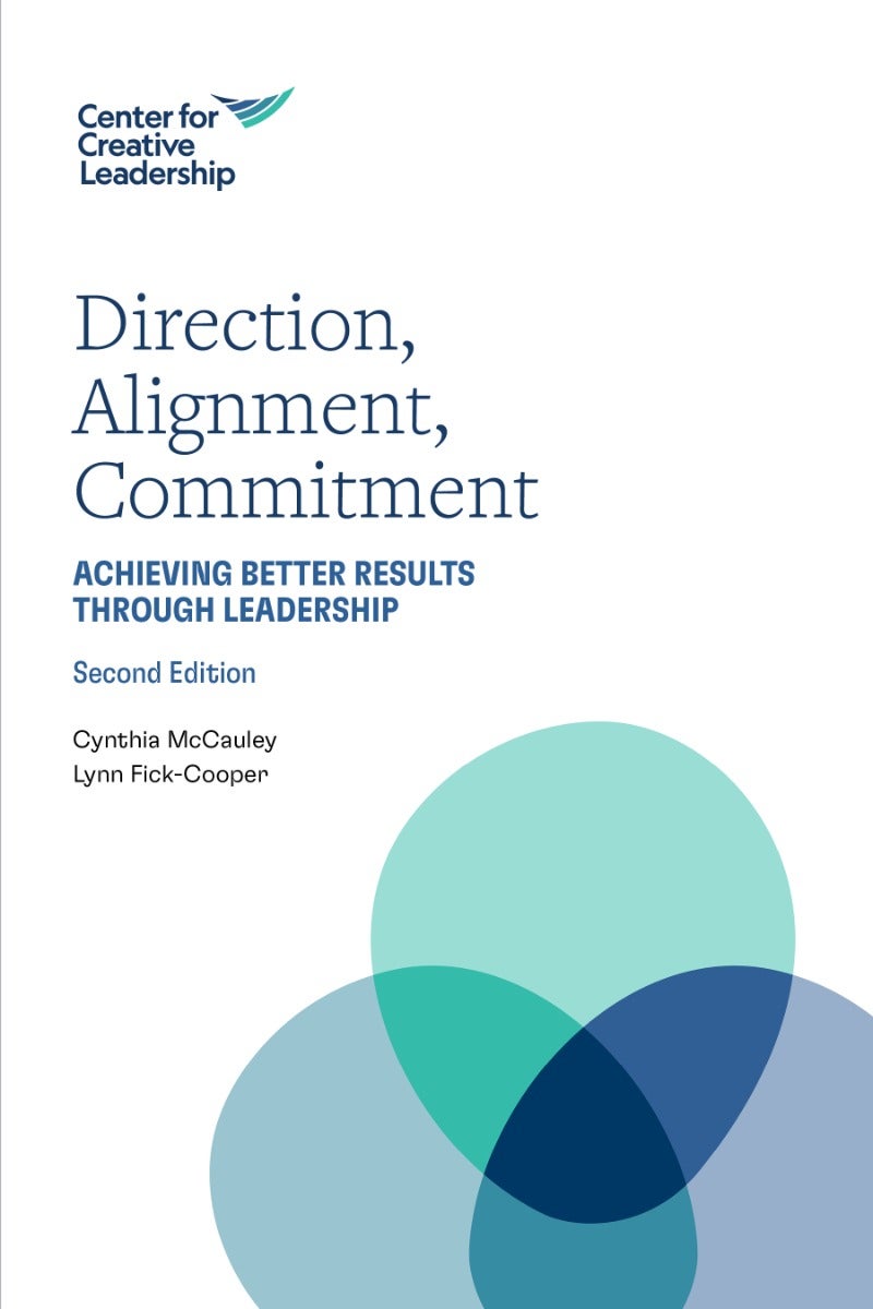 The&#x20;cover&#x20;of&#x20;&quot;Direction,&#x20;Alignment,&#x20;Commitment&#x3A;&#x20;Achieving&#x20;Better&#x20;Results&#x20;through&#x20;Leadership&quot;&#x20;Second&#x20;Edition.&#x20;